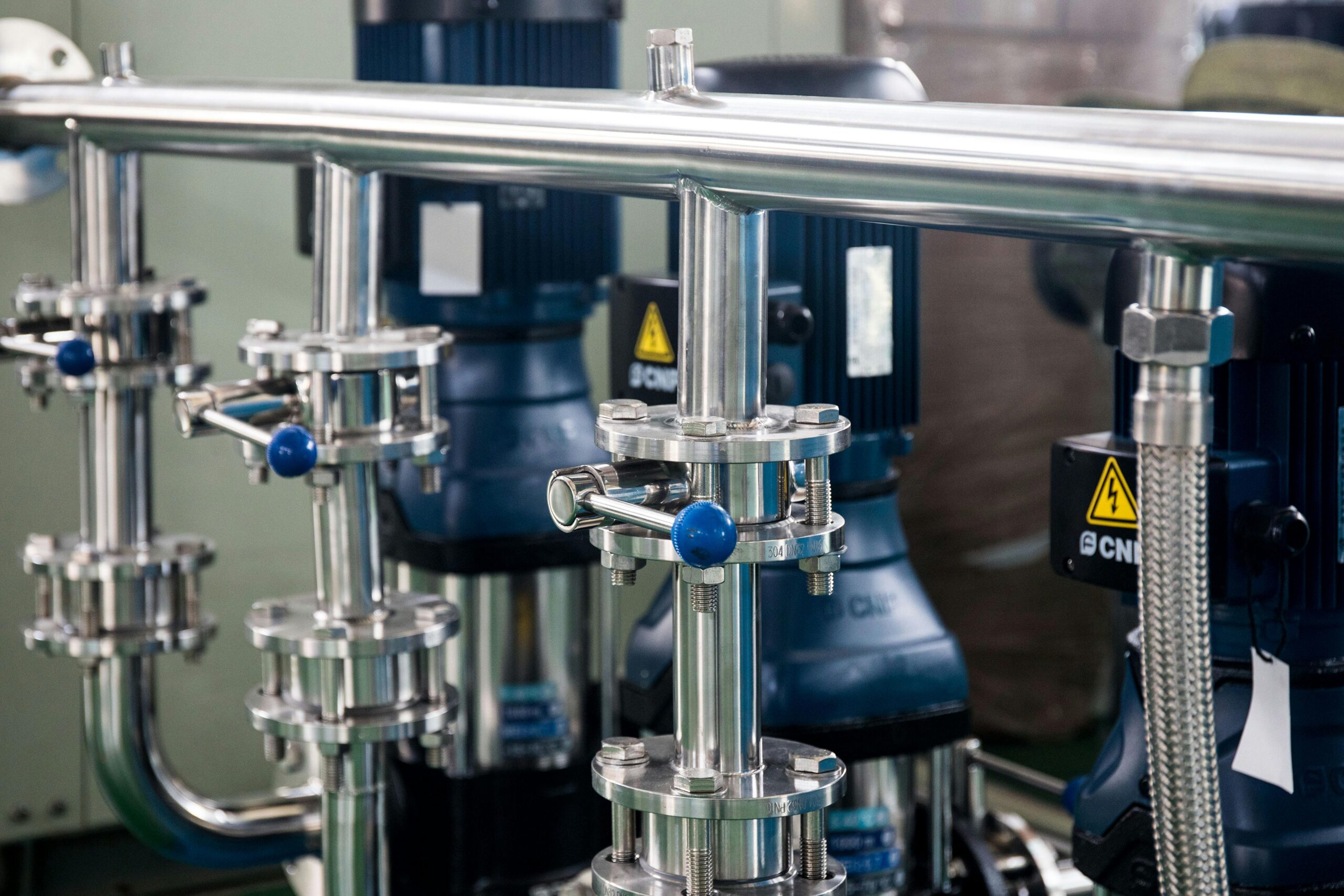 Corrosion resistant stainless steel pipelines in a chemical plant for leak proof industrial pump solutions.